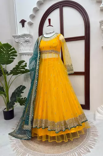 Yellow net thread flared gown set