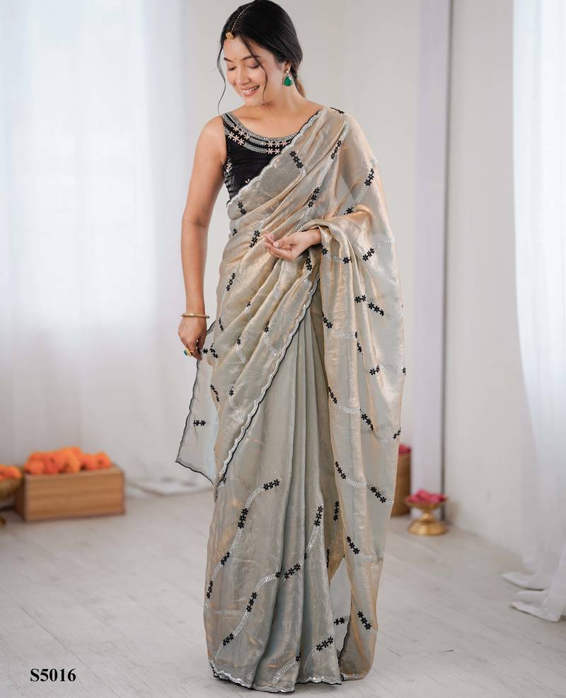 Grey fendy satin embroidered saree with unstitched blouse