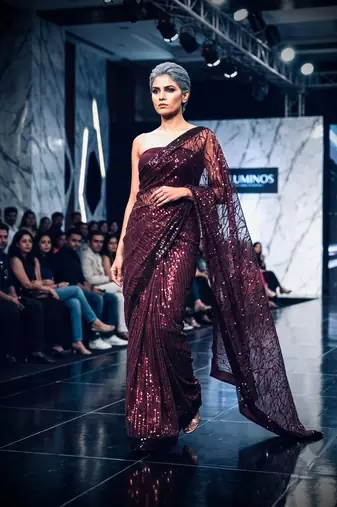 Plum imported half half sequin saree with silk blouse