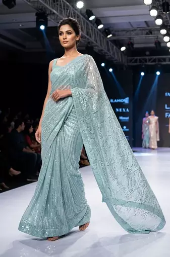 Blue imported half half sequin saree with silk blouse