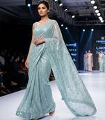 Blue imported half half sequin saree with silk blouse