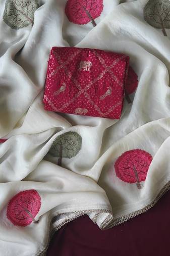 White Color mottifs embroidory Work georgate Saree