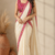 cream ready to wear saree with pink floral embroidered border & embroidered stitched blouse.