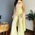 Women's yellow faux georgette embroidered kurti set with palazzo and dupatta