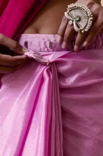 pre stitched Pink georgette woven saree with zari work