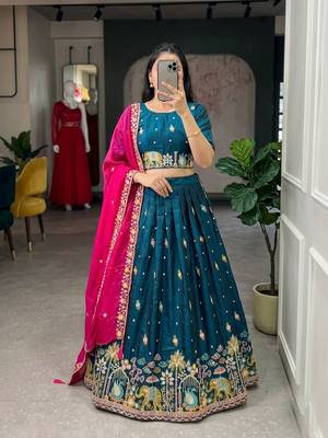 teal silk blend embroidered wedding lehenga choli with free size upto 44 1