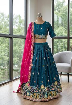 teal silk blend embroidered wedding lehenga choli with free size upto 44 2