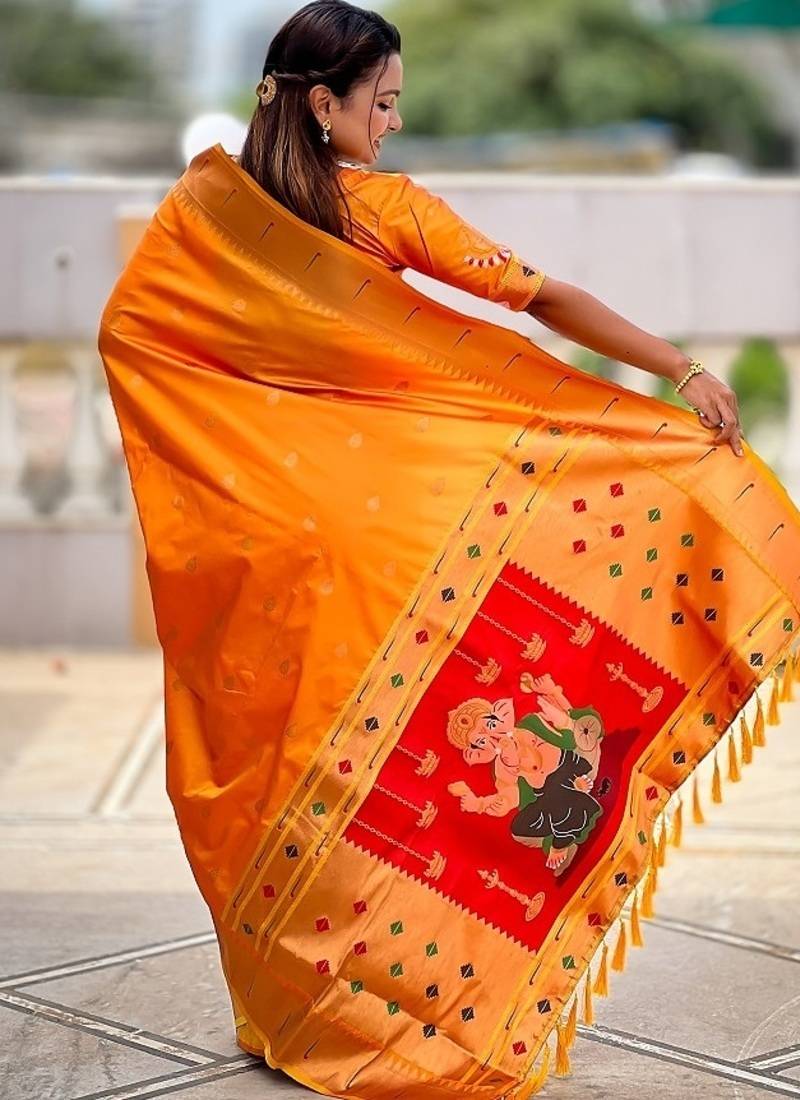 orange soft paithani style silk blend with meenakari border and lord ganesha pallu saree