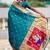 teal soft paithani style silk blend with meenakari border and lord ganesha pallu saree