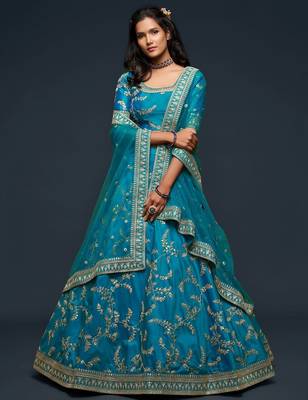 teal blue art silk embroidered navratri lehenga choli with free size upto 42 1