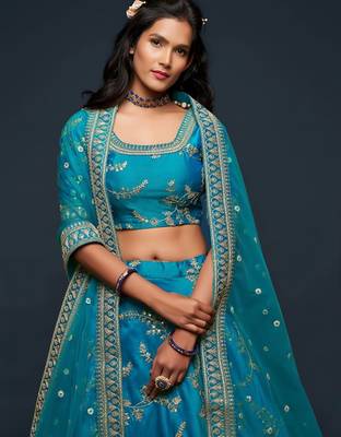 teal blue art silk embroidered navratri lehenga choli with free size upto 42 2