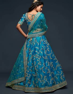 teal blue art silk embroidered navratri lehenga choli with free size upto 42 3