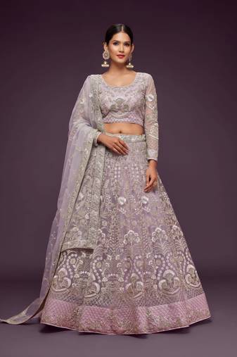 lavender net embroidered wedding lehenga choli with free size upto 42