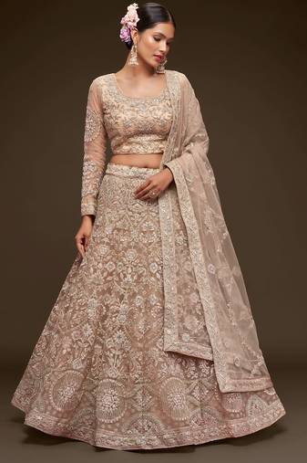 beige net embroidered wedding lehenga choli with free size upto 42