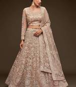 beige net embroidered Wedding lehenga choli