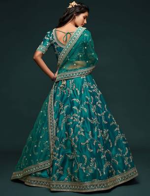 teal green art silk embroidered navratri lehenga choli with free size upto 42 2