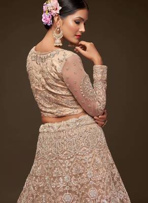 beige net embroidered wedding lehenga choli with free size upto 42 2