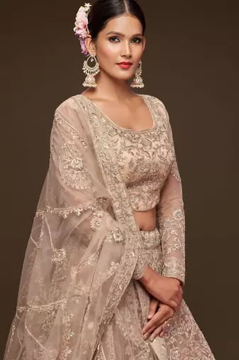 beige net embroidered Wedding lehenga choli