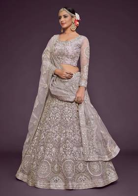 lavender net embroidered wedding lehenga choli with free size upto 42 1