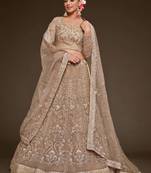 beige net embroidered Wedding lehenga choli