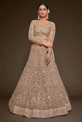 beige net embroidered wedding lehenga choli with free size upto 42 4