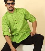 cotton blend floral printed green roll-up sleeves short kurta