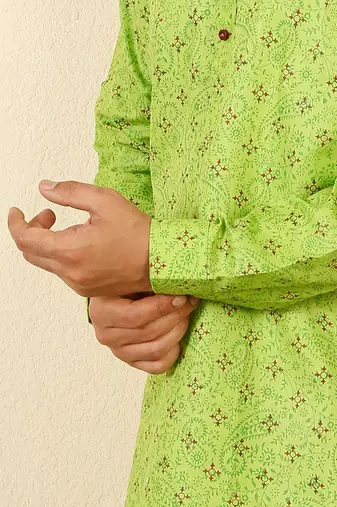 cotton blend floral printed green roll-up sleeves short kurta