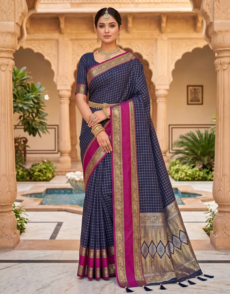 Navy blue soft  silk with zari weaving chex &  rich pallu with contrast silk blouse