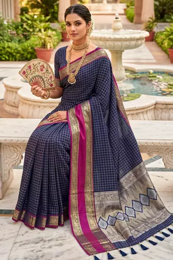 Navy blue soft  silk with zari weaving chex &  rich pallu with contrast silk blouse