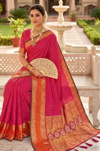Rani pink soft  silk with zari weaving chex &  rich pallu with contrast silk blouse