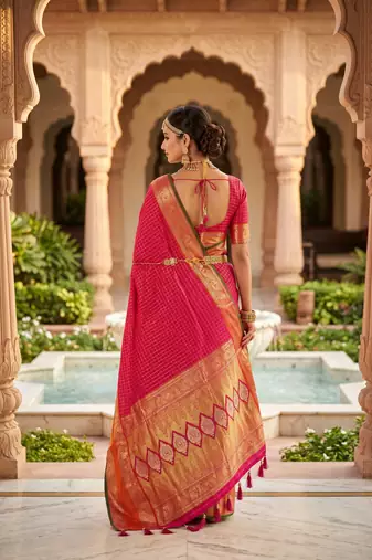 Rani pink soft  silk with zari weaving chex &  rich pallu with contrast silk blouse