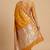 Banarasi semi silk saree in orange colour with  floral zari  work