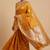 Banarasi semi silk saree in orange colour with  floral zari  work