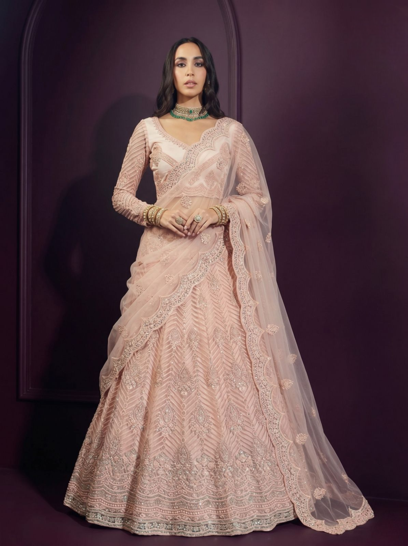 Peach butterfly net fabric with embroidered, resham, sequence, thread work lehengas for your wedding look