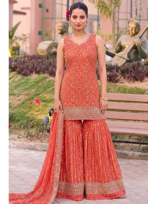 Orange bandhani printed heavy emrboidery worked sharara suit ethnic wear 1