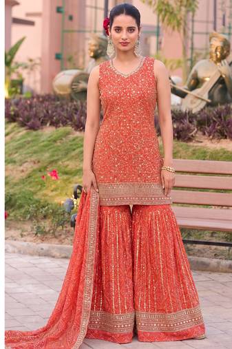 Orange bandhani printed heavy emrboidery worked sharara suit ethnic wear