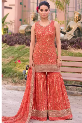 Orange bandhani printed heavy emrboidery worked sharara suit ethnic wear