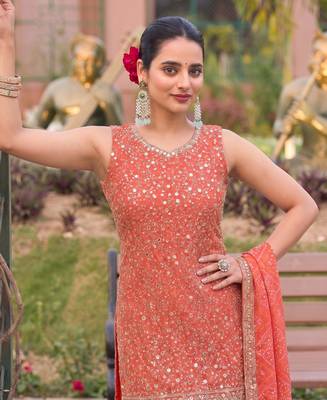 Orange bandhani printed heavy emrboidery worked sharara suit ethnic wear 2