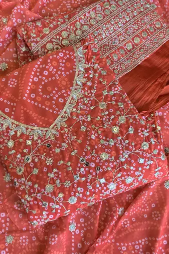 Orange bandhani printed heavy emrboidery worked sharara suit ethnic wear