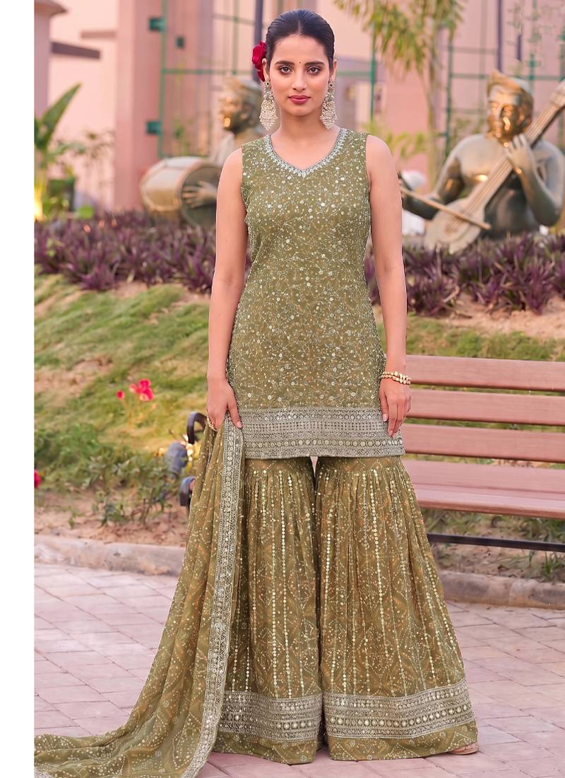 Mustard bandhani printed heavy emrboidery worked sharara suit ethnic wear