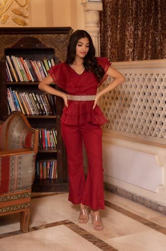 Magenta solid georgette v-neck ruffle top & flared pant co-ord set for women