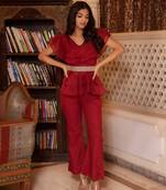 Magenta solid georgette v-neck ruffle top & flared pant co-ord set for women