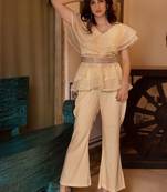 Beige solid georgette v-neck ruffle top & flared pant co-ord set for women