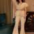 Beige solid georgette v-neck ruffle top & flared pant co-ord set for women