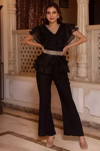 Black solid georgette v-neck ruffle top & flared pant co-ord set for women