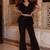 Black solid georgette v-neck ruffle top & flared pant co-ord set for women