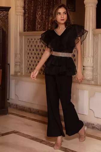 Black solid georgette v-neck ruffle top & flared pant co-ord set for women