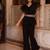 Black solid georgette v-neck ruffle top & flared pant co-ord set for women