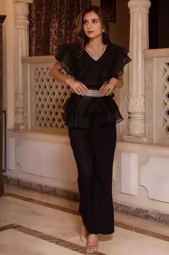 Black solid georgette v-neck ruffle top & flared pant co-ord set for women