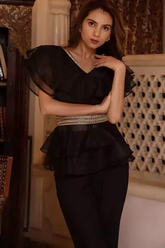 Black solid georgette v-neck ruffle top & flared pant co-ord set for women